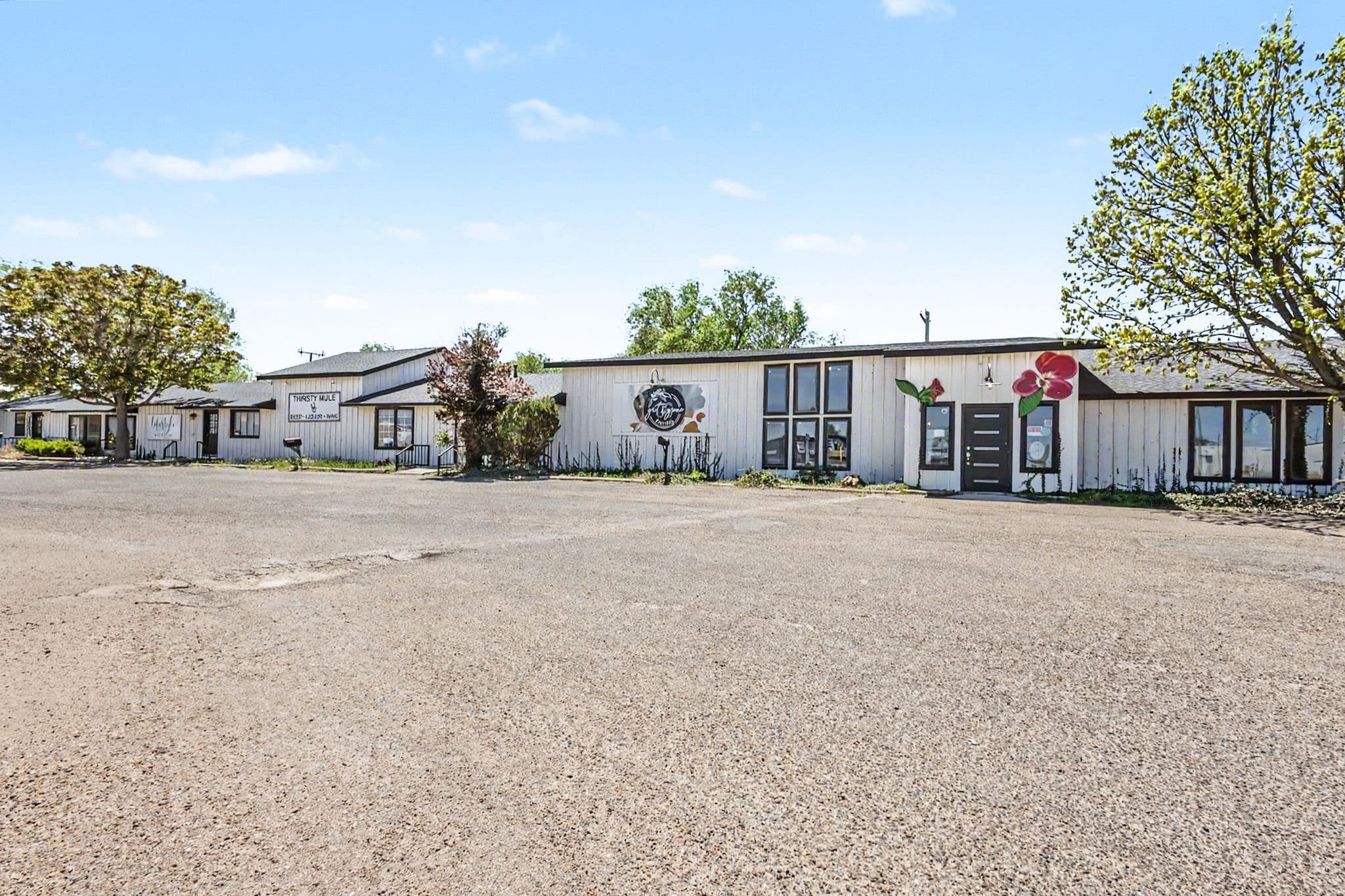 Exterior of the Muleshoe Art Loft Airbnb, a short-term rental on a quiet street in Muleshoe, TX.