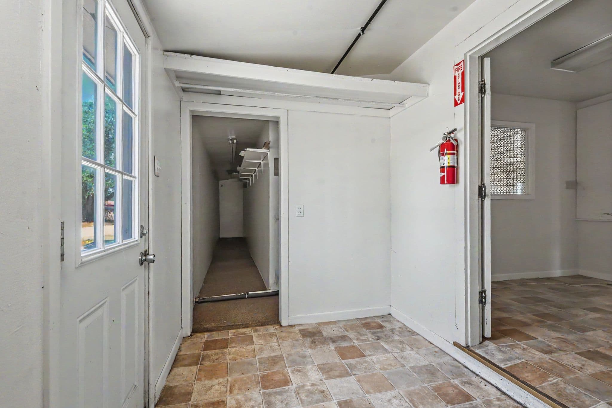 Interior shot of backdoor and storage closet